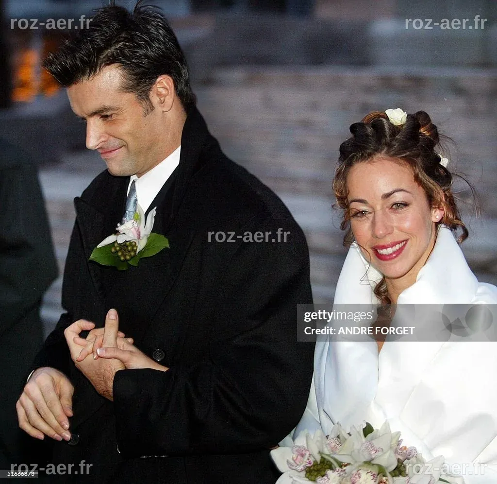 Canadian singer Roch Voisine and his bride Myriam St-Jean exit St ...